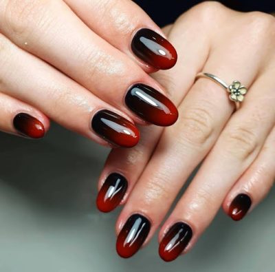 This flawless Red and black ombre nail design is one of the most popular manicure styles. They would look elegant with your evening gown.