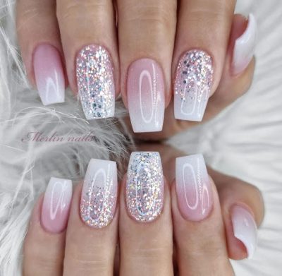 Not only do Ombre nails look great with pink and white gradients, but they also look surreal with glitter and gems.