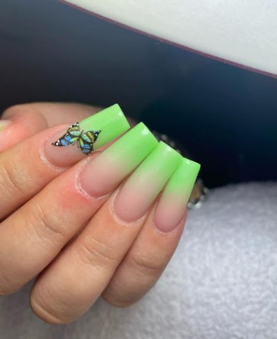 These accent nails with a beautiful butterfly are a chic option. If you want to make a bold statement with your nails, then you should try this Ombre nail idea.